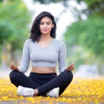 Woman practicing gentle yoga for ulcerative colitis stress management