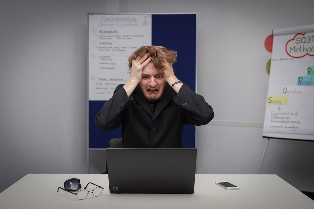 man grabbing head out of stress, looking for stress relief tips